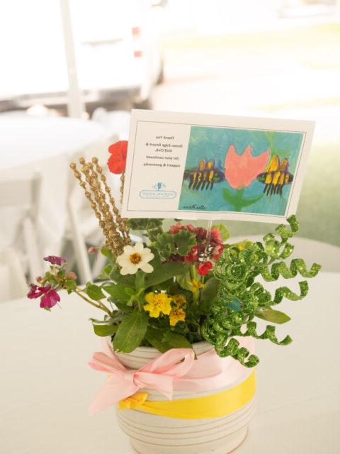 Centerpiece of flowers on a table.